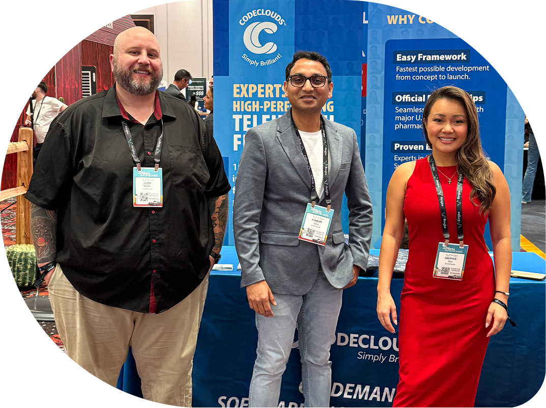 The CodeClouds team at their conference booth